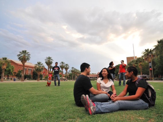 students talking on the University of Arizona campus