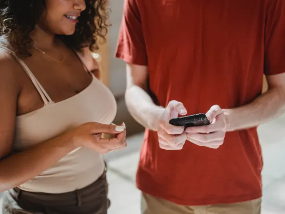 close-up of hands holding a phone